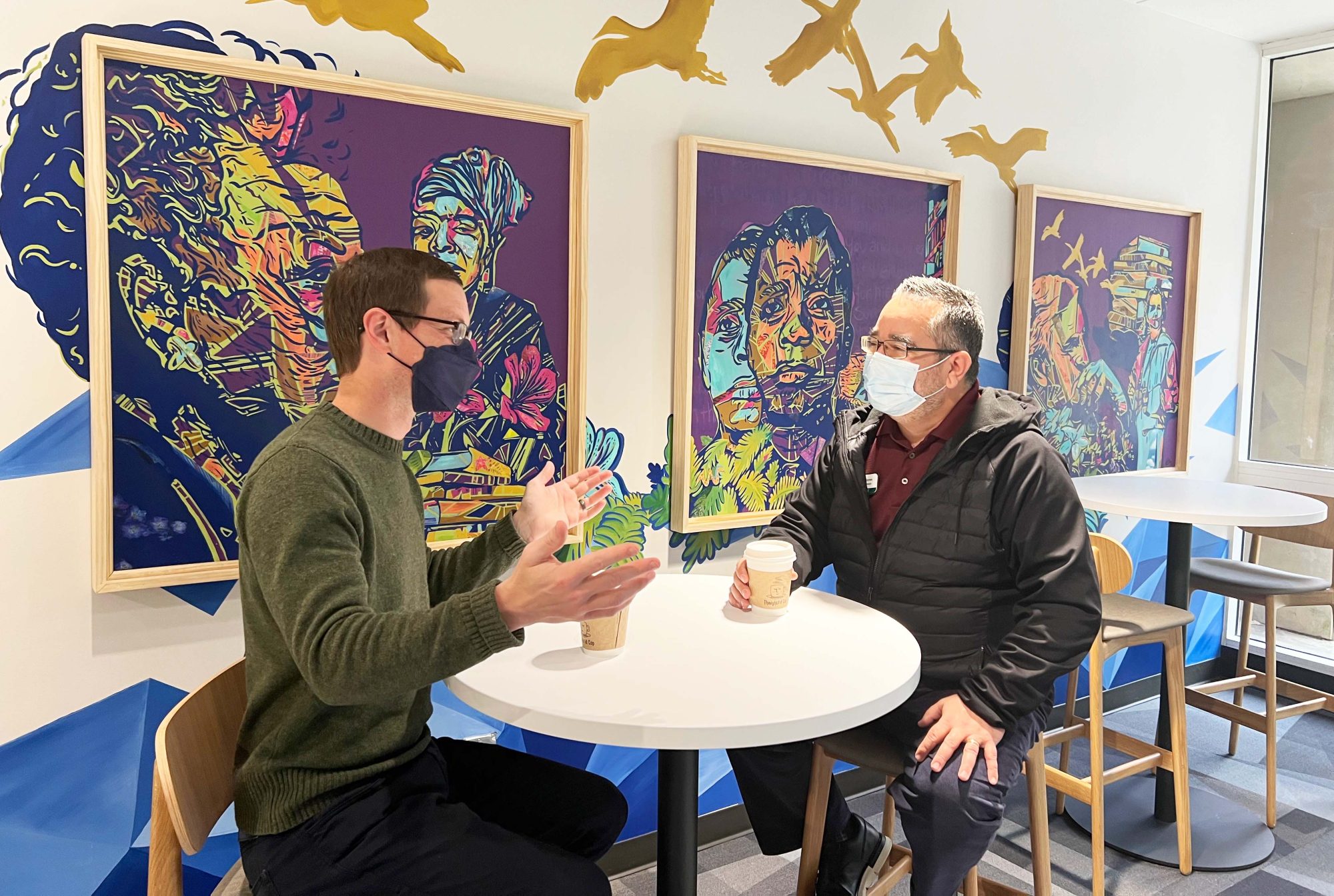 Two people having coffee